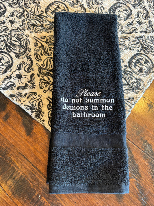 Summoning demons Hand towel